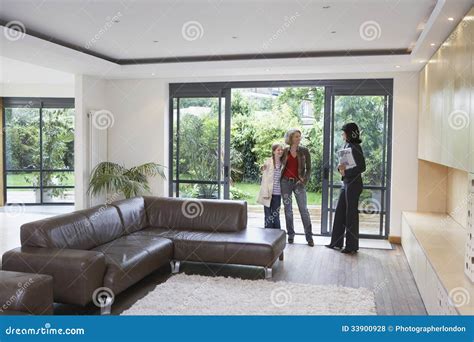 Real Estate Agent Helping Mom and Daughter Find a New .